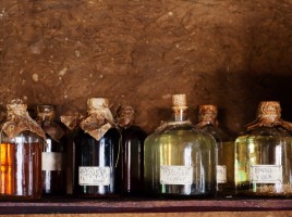 old potion bottles on a dark background